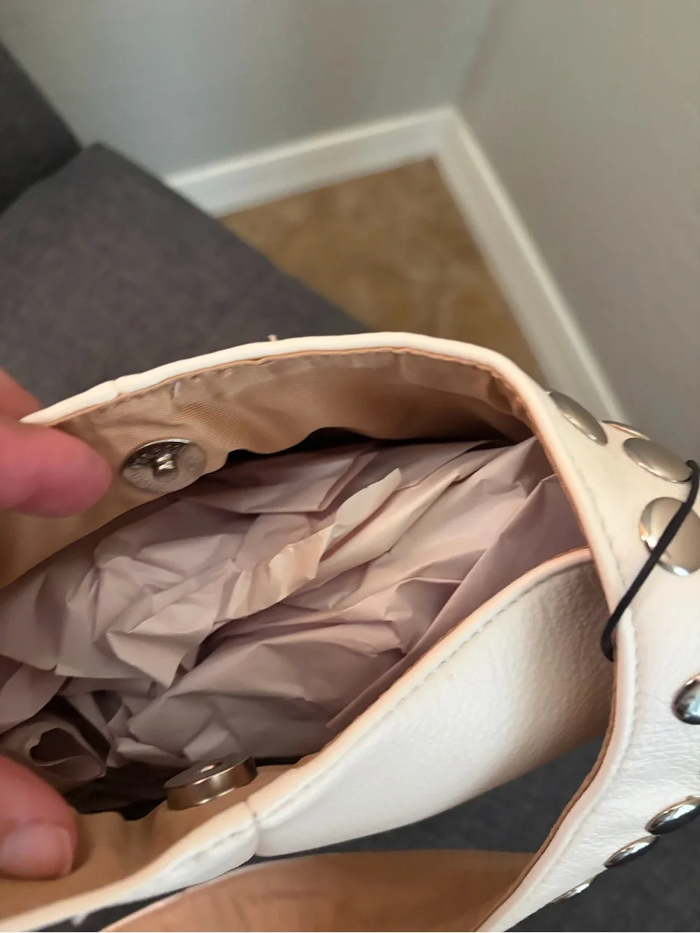Studded White Hobo Bag with Metallic Accents